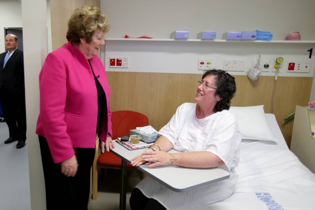 Health Minister Jillian Skinner visits a patient during her visit to the new emergency department of St George Hospital. Picture: Jane Dyson
