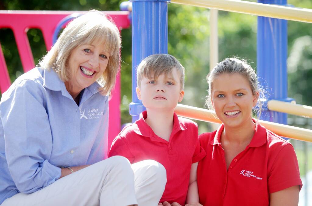 Great environment: Parents whose children attend Aspect South East Sydney School have launched a petition to help raise awareness about the need for a bigger school. Pictured are Rowena Perritt, Will Gregory and teacher Alyce Elphick. Picture: Chris Lane