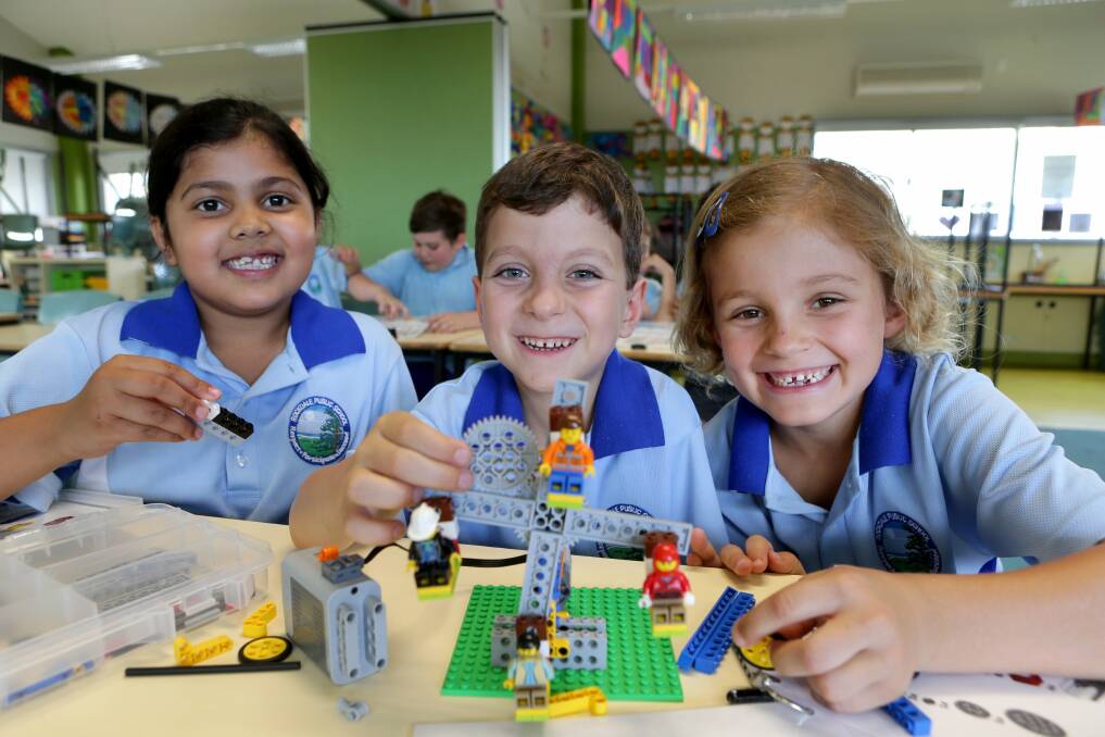 Educational fun: Tanvi Shukla, Jordi Omeros and Mia Princip learn through Lego. Picture: Jane Dyson