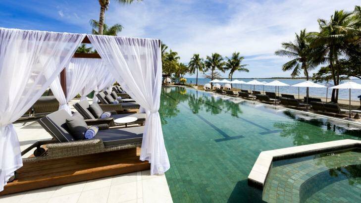 Relax poolside: Waitui Beach Club has its own pool, champagne bar, poolside cabanas, gym and restaurant. Photo: Supplied