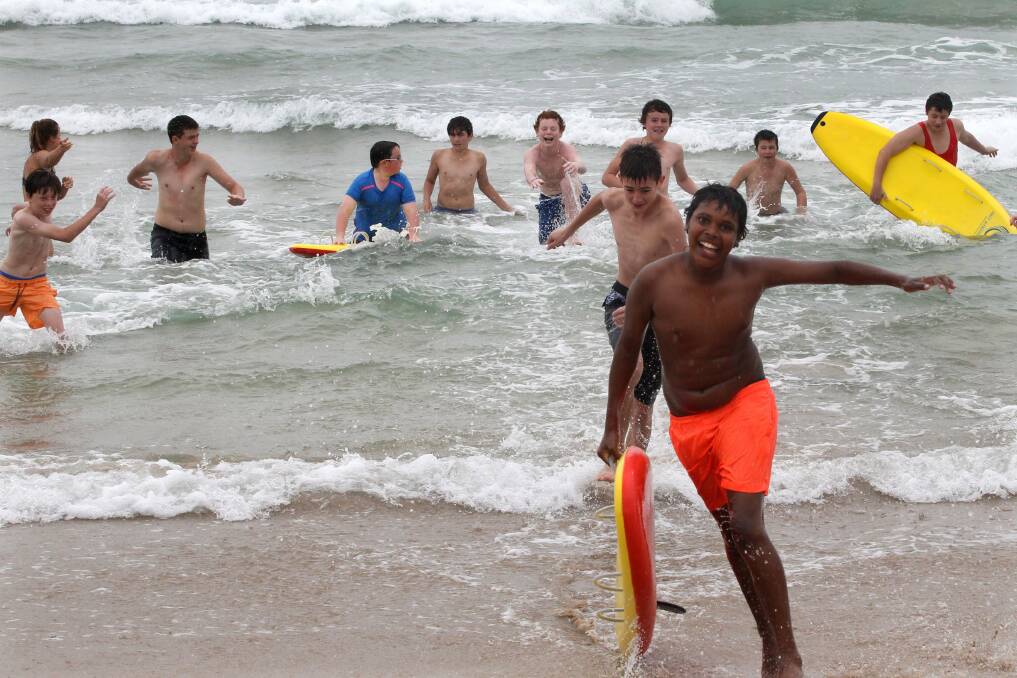 Trip of a lifetime: Broken Hill teens have a go at surfing. Picture: Jane Dyson