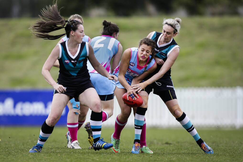 Southern power women's afl team (undefeated) beat Wollongong Saints in the afl grand final. Picture: Anna Warr