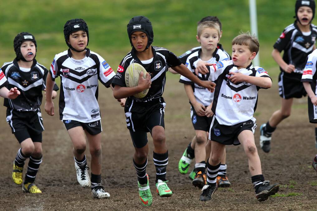 End of an era: Action last Sunday from the Tommy Bishop Shield under-7s team. Picture John Veage