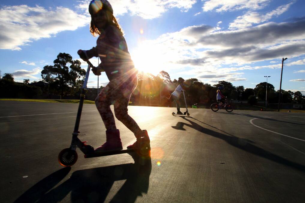 Kids make the most of their school holidays, cycling, skootering, skating and enjoy the winter sun at Old's Park. Picture: Jane Dyson
