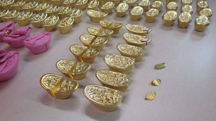 A man was charged with selling fake gold ingots in a $60,000 transaction. Photo: Police Media 
