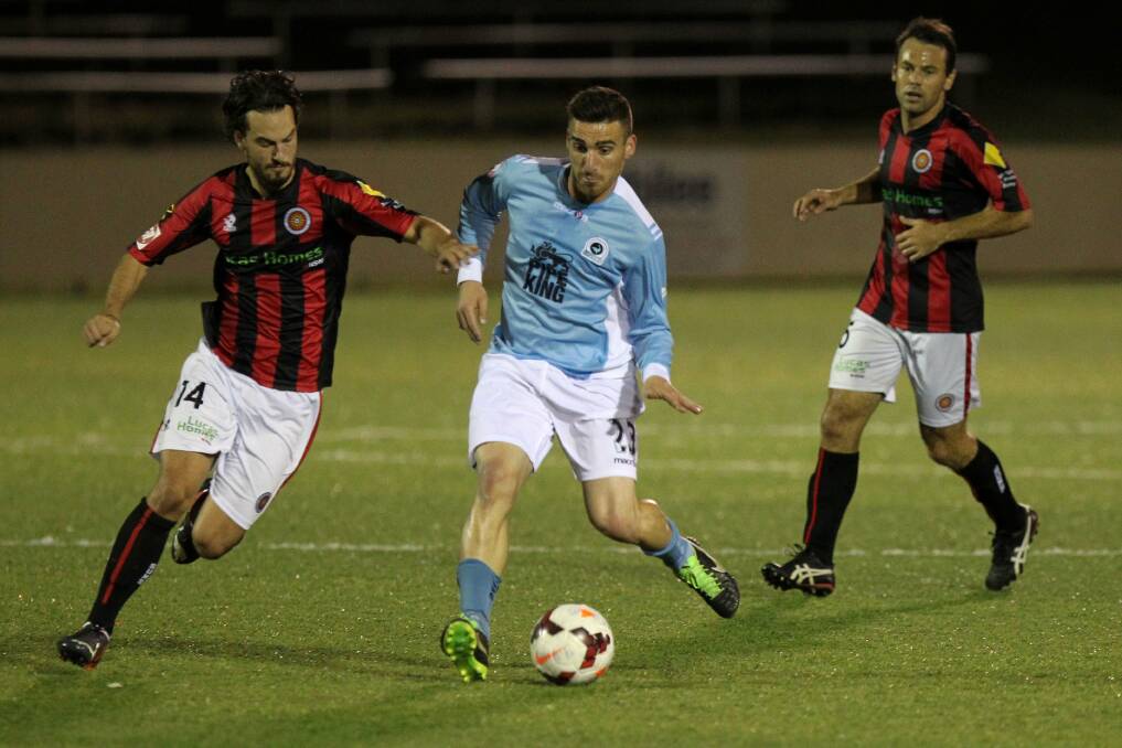 Gone: Sutherland Sharks FC player Panny Nikas (centre) has left to join Sydney United FC 58 next season. Picture: John Veage