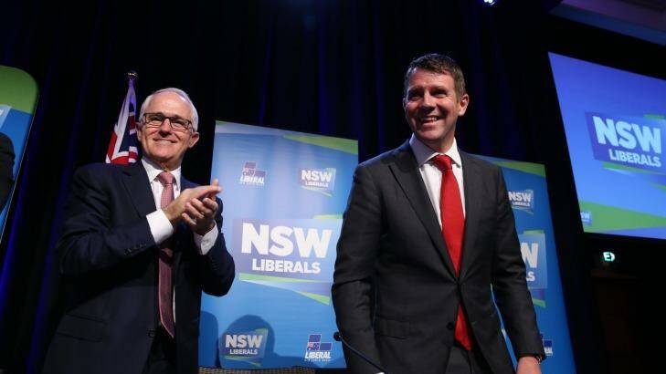 Prime Minister Malcolm Turnbull and NSW Premier Mike Baird at the NSW Liberal Party state conference at Sydney's Four Seasons Hotel on Saturday. Photo: Louise Kennerley