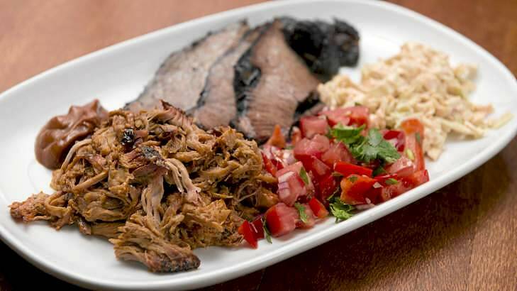 Hudson Corner's barbecue combo plate: pulled pork, brisket, slaw and Tex-Mex salsa. Photo: Harrison Saragossi