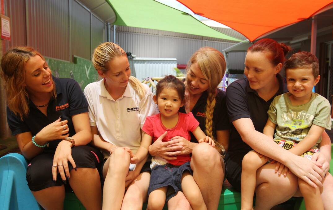St George represented: The team at Peakhurst Early Learning Centre was nominated for a national award. Pictured are Claire Spiteri, Cassandra Smith, Rebecca Badman and Ellen McGuinn with Ashley and Ayden. Picture: Chris Lane