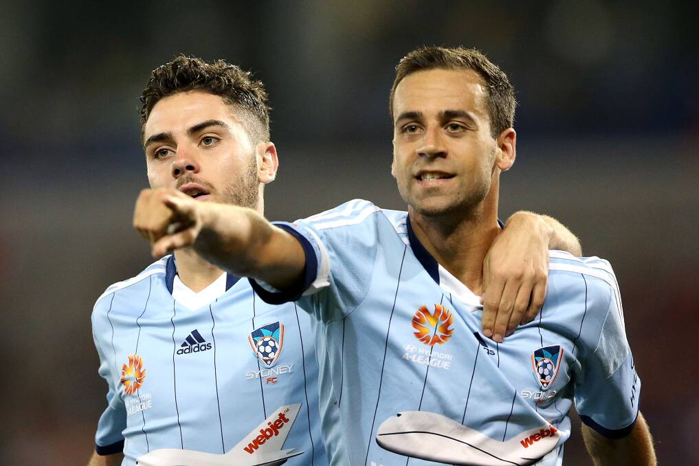 Happy days: Christopher Naumoff (left) and Alex Brosque of Sydney FC celebrate a goal during the A-League match against Newcastle Jets at Hunter Stadium on April 17. Picture: Ashley Feder, Getty Images
