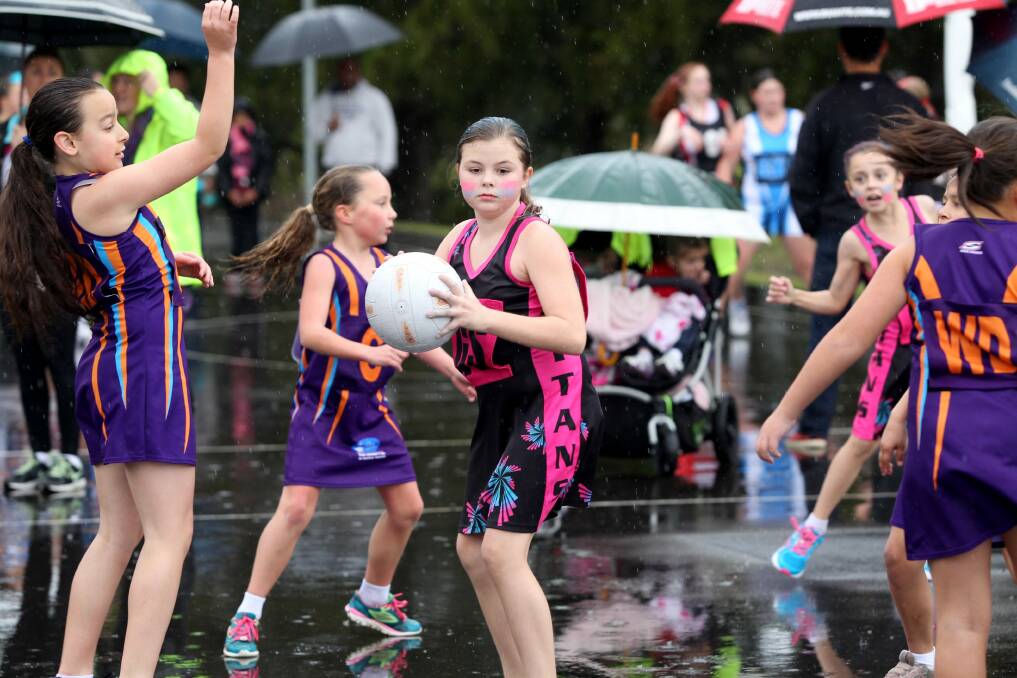 Big year ahead: St George District Netball Association enjoyed a huge season last year and on grand final day, Titans and Kyle Bay 9B played in a wet premiership decider at Rockdale (Kyle Bay 9B won).Picture: Jane Dyson