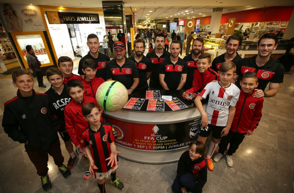 Ready for action: Rockdale City Suns players and supporters at Westfield Hurstville on Sunday to promote their FFA Cup clash with Melbourne Victory. Picture: John Veage