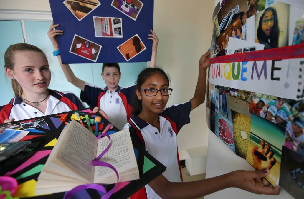 Positivity in the classroom: Taylah Dempster (left), Sheetal Mangipudi and Joshua Mayne get into the spirit of their school's mental health workshops. Picture: John Veage