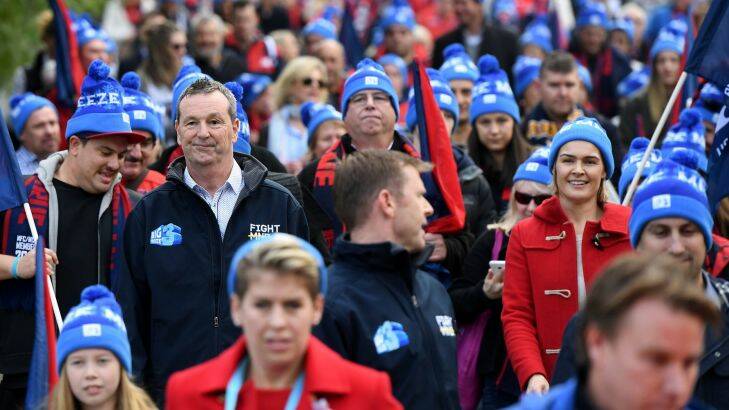 Neale Daniher leads supporters to Big Freeze 3 before the Round 12 AFL match between the Melbourne Demons and the Collingwood Magpies at the MCG in Melbourne, Monday, June 12, 2017. Big Freeze 3 and FIGNT MND is an initiative by the former AFL footballer and coach who has Motor Neuron Disease. (AAP Image/Julian Smith) NO ARCHIVING, EDITORIAL USE ONLY .