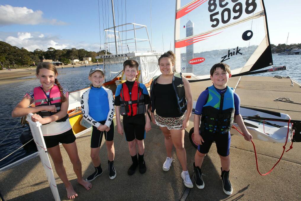 Let's go sailing: Cronulla Sailing Club members Teisha Hume, Jenna Searle, Izabella Monteiro, Luke Kieselbach and Mackenzie Janes. Picture: John Veage