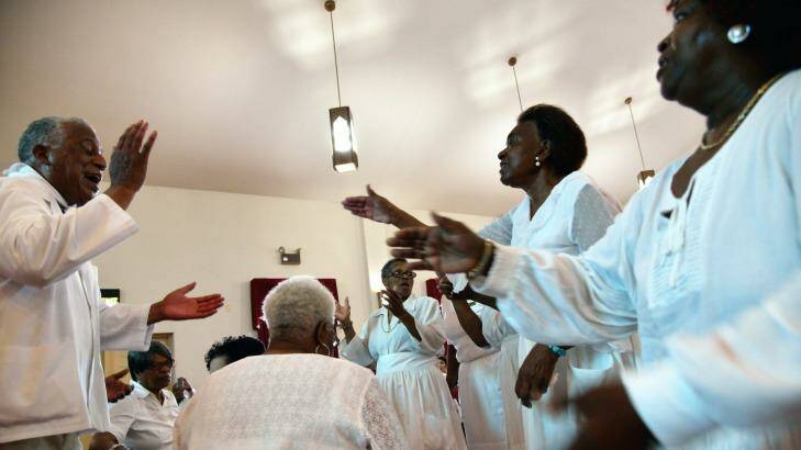Pastor Jerry Colbert, 64, (left)  the great grand son of a slave, leads a Singing and Praying Band group at the Hall United Methodist Church in Glen Burnie, Maryland.
 Photo: Dermot Tatlow