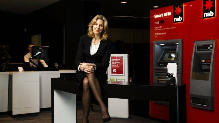 Melissa Reynolds, NAB executive general manager retail, in the new-look NAB bank. The roll-out started in Chatswood and will go through the nation.  Photo: Nic Walker