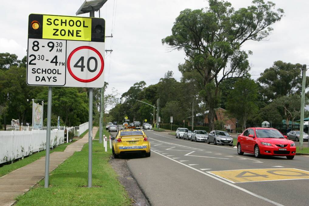 In the zone: Motorists face fines for speeding near schools even when there are no pupils. Picture: Natalie Roberts
