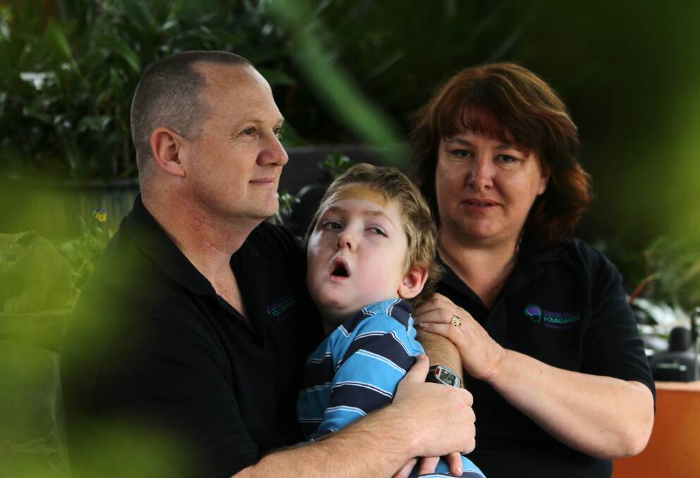 Tragic: Michael and Jo-Ann Morris with son Samuel. Picture: Wolter Peeters