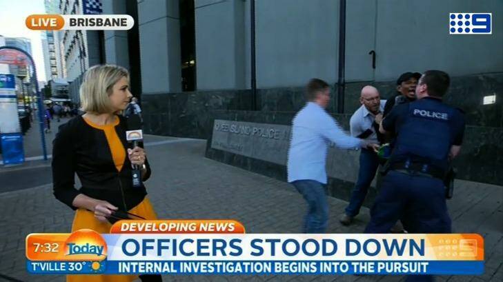 A Today reporter had her live cross interrupted by a dramatic arrest on Friday. Photo: Supplied