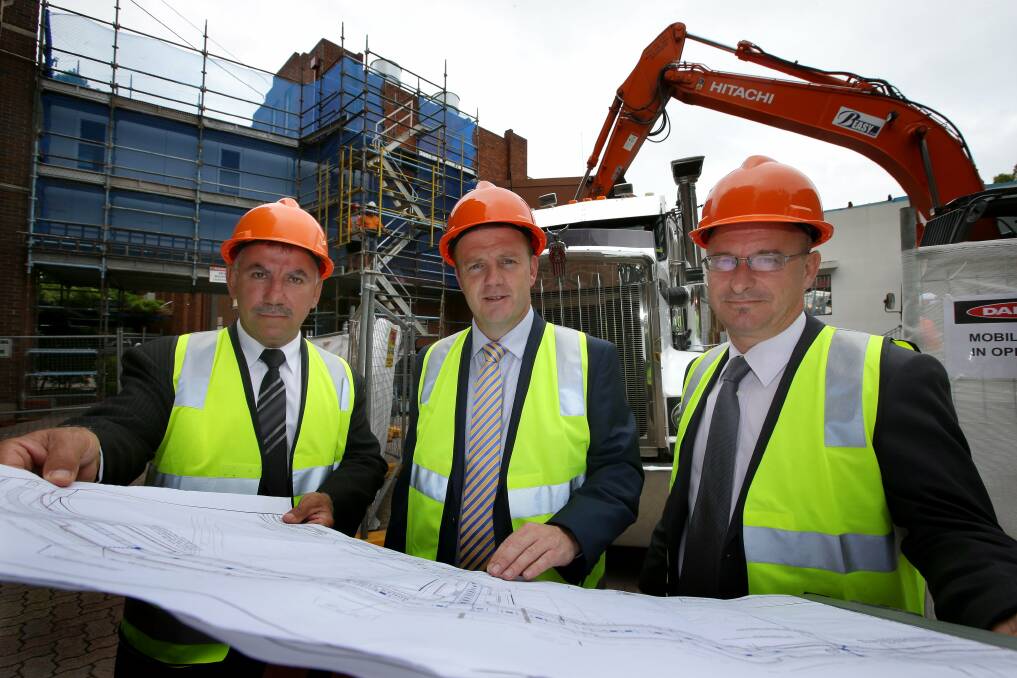 A new beginning: Construction has begun on the new Rockdale Library. (From left) Joe Awada, mayor Shane O'Brien and James Macdonald. Picture: John Veage