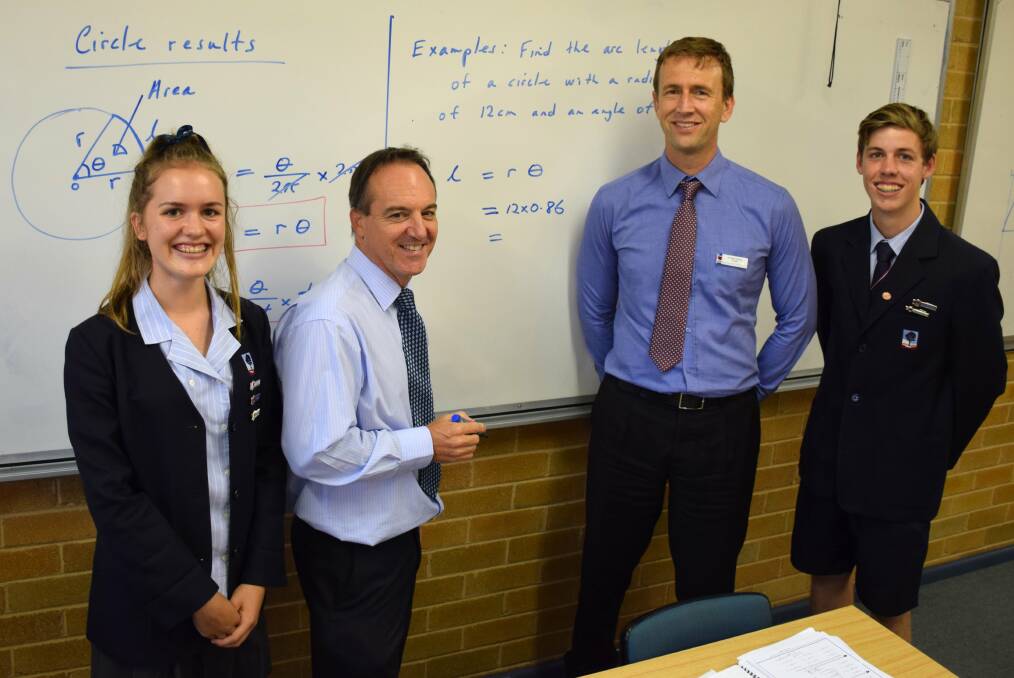 Numbers games: Sutherland Shire Christian School encourages senior students including Samantha Begg and Andrew Grose to be competent in maths. They are with maths teacher Chris Kearns and principal Brett Hartley (second from right).