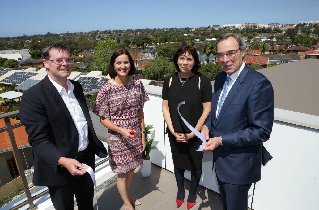 There to care: CE Stephen Judd, Kim Townsend(mng) Isobel Skelton(servicemng) and Rod Mewing (chairman) -Staff and residents celebrate the opening of HammondCare's newest retirement living complex in Sutherland Shire. Picture:John Veage