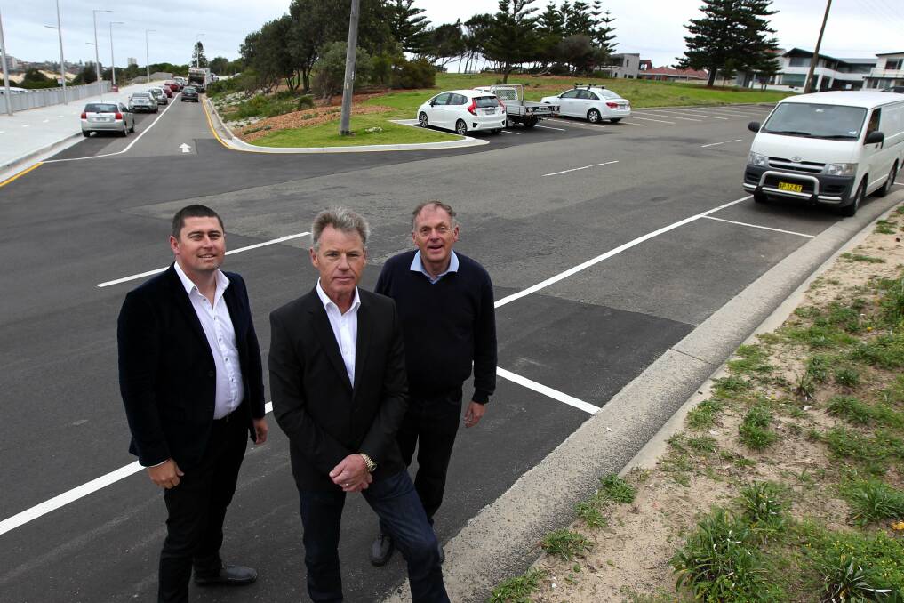 On your mark: ShireBiz member Tony Blain has persuaded the council to trial marked parallel parking spaces at three sites in the Cronulla CBD. He is pictured with Carl Robinson and Malcolm Kerr outside the Wanda Surf Lifesaving Club which has several marked parking spaces.Picture John Veage