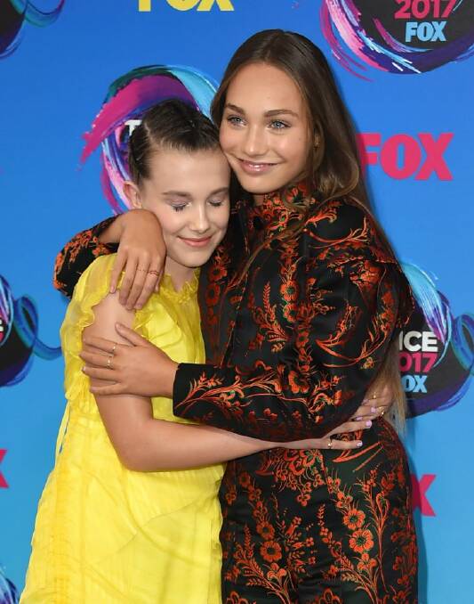 Millie Bobby Brown, left, and Maddie Ziegler arrive at the Teen Choice Awards at the Galen Center on Sunday, Aug. 13, 2017, in Los Angeles. (Photo by Jordan Strauss/Invision/AP)