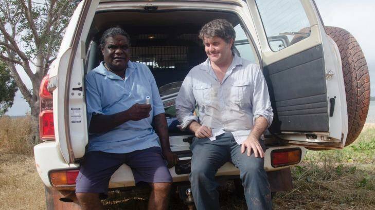 Biological anthropologist Michael Westaway from Griffith University obtains a saliva sample from Thanakwith elder Thomas Wales in Cape York. Photo: Tom Cebula, Wall to Wall Media