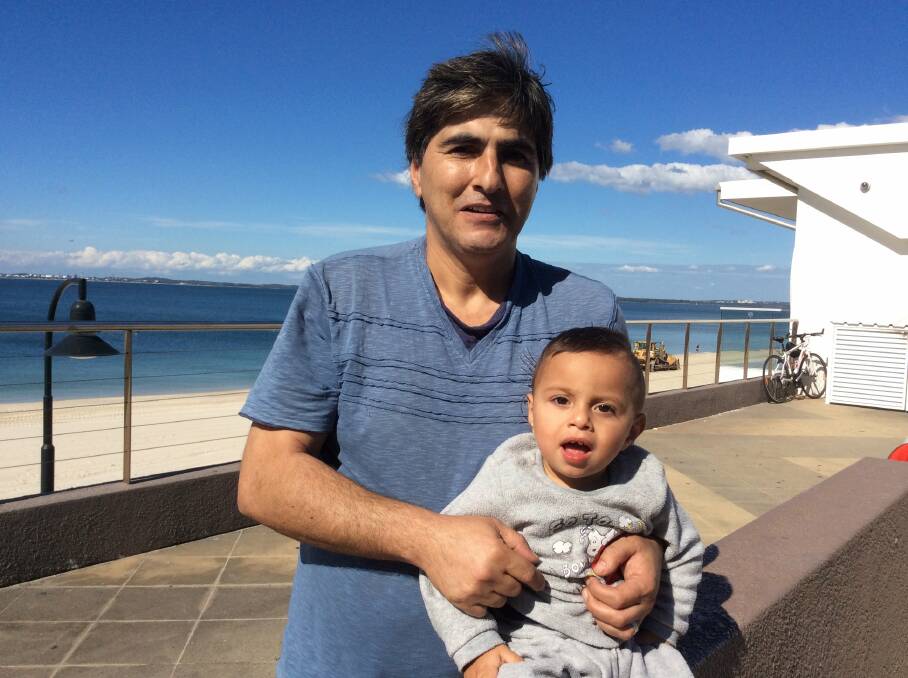 Robert Sabra, with Hassan, 15 months.