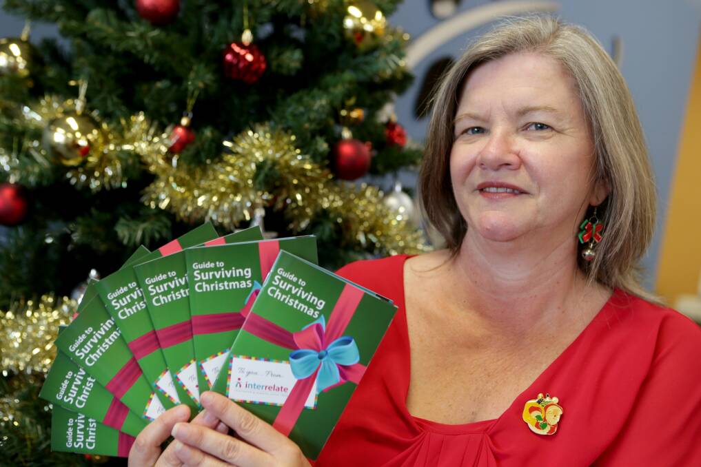 Not an easy time for everyone: Sydney area manager Julie Dale with the Interrelate Guide to Surviving Christmas.