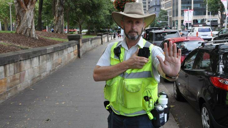 Ranger Phill McGill tests out the new body cameras being rolled out by the city of Sydney.