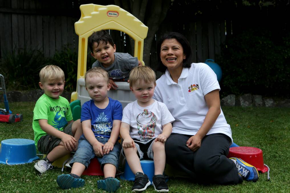 Doing it for the kids: Magda Sanchez, with daycare kids Tyler, George, Thomas and Tom. Picture: Jane Dyson
