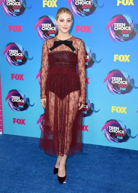 Katherine Langford arrives at the Teen Choice Awards at the Galen Center on Sunday, Aug. 13, 2017, in Los Angeles. (Photo by Jordan Strauss/Invision/AP)