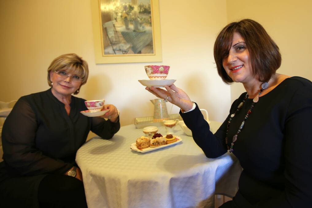 Raise your cup: Josephine Petrak (left) and Chantal Murr are doing their bit for people with cancer. Picture: John Veage