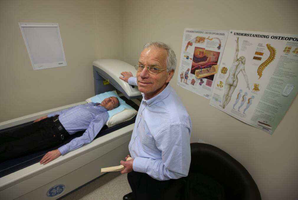 Break the cycle: Dr Klaus Stelter assesses Nida Khoury at the Ferndale Bone Density Clinic at Mortdale. Picture: John Veage