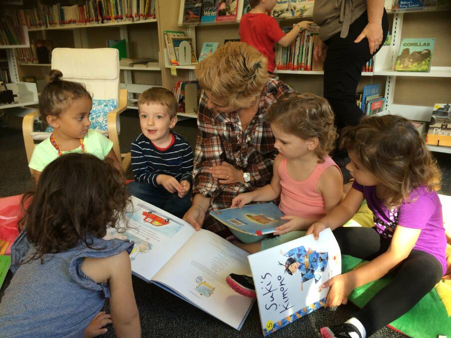 Loving books: Keen young readers at Sydney Montessori School, Gymea.