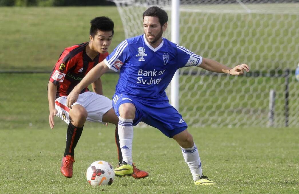 Challenge: Rockdale City Suns Tony Lo (left) in action against Sydney Olympic on Sunday. Picture: Football NSW