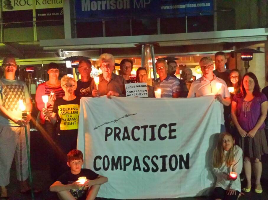 Not happy: Protesters keep a vigil outside Scott Morrison's Cronulla office.