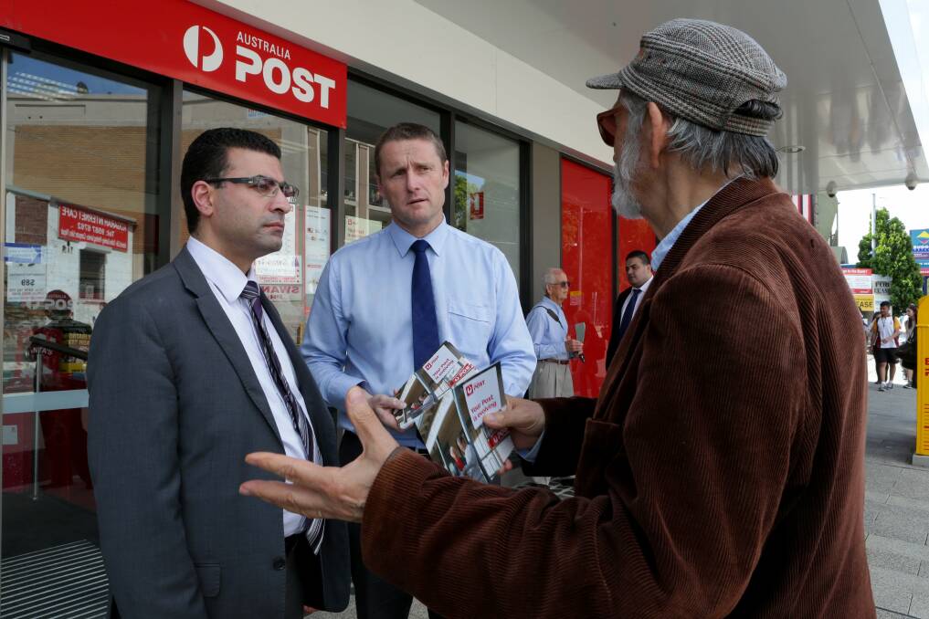 Evolution: Barton MP Nickolas Varvaris (left) and Stephen Price from Australia Post were at Kogarah post office to listen to people's views about postal changes. Picture: Jane Dyson