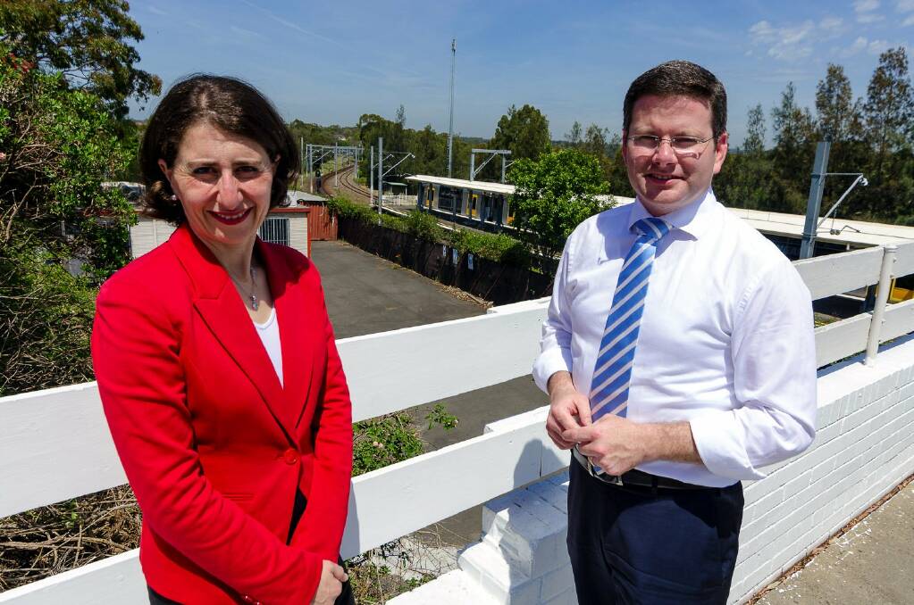 It's all happening: Gladys Berejiklian and Mark Coure at the new car park spot.