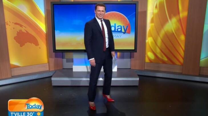 The Today show host complained that his back hurt while wearing the ruby red heels on Friday. Photo: Channel Nine