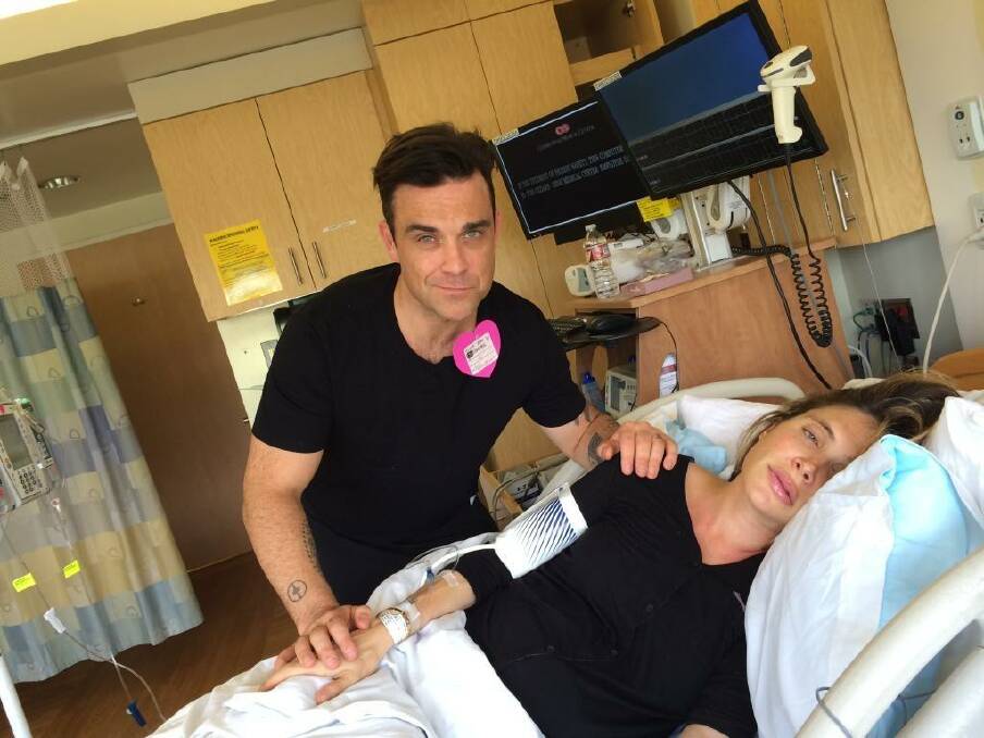 Robbie Williams and his wife, Ayda Field, during her 14-hour birth with their second child.