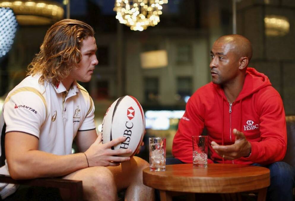 The ambassadors: Wallabies forward Michael Hooper, the newest Test captain, gets some tips from retired halfback George Gregan, the most-capped leader of the national team.