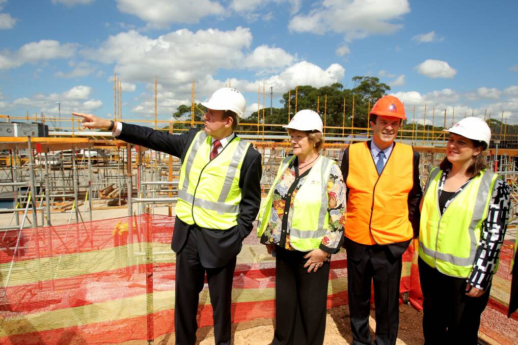 Project progress:  Premier Barry O'Farrell (left), Health Minister Jillian Skinner and MPs Mark Speakman and Melanie Gibbons inspect work on the new multi-storey car park at Sutherland Hospital. Picture: Chris Lane