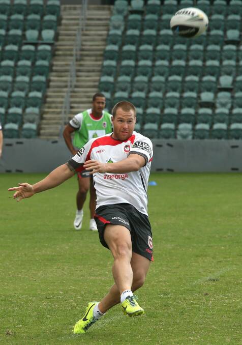 Man of the moment: Trent Merrin is looking forward tomorrow to his 100th first grade game for the Dragons. Picture: Kirk Gilmour