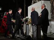A large crowd gathered at the Sydney Cenotaph for the dawn service before wreaths were laid. (Dean Lewins/AAP PHOTOS)
