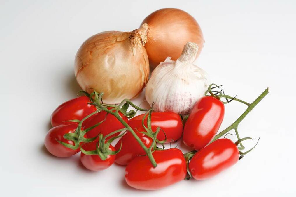 Italian staples: Onions, garlic and tomatoes. Photo: Eddie Jim