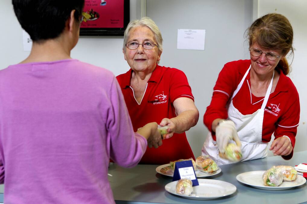 Helpful grants: Volunteers at work at the Kogarah Storehouse in 2012.